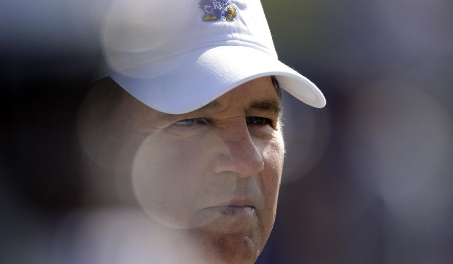 Kansas head coach Les Miles watches during the first half of an NCAA college football game against Indiana State Saturday, Aug. 31, 2019, in Lawrence, Kan. (AP Photo/Charlie Riedel)