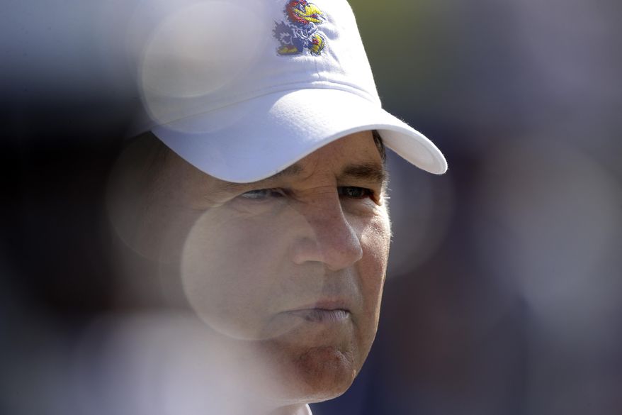 Kansas head coach Les Miles watches during the first half of an NCAA college football game against Indiana State Saturday, Aug. 31, 2019, in Lawrence, Kan. (AP Photo/Charlie Riedel)