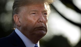President Donald Trump pauses as he talks to media before boarding Maine One at the White House in Washington, Friday, Aug. 30, 2019, en route to Camp David in Maryland. (AP Photo/Carolyn Kaster)