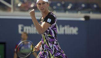 Elise Mertens, of Belgium, reacts after scoring a point against Andrea Petkovic, of Germany, during round three of the US Open tennis championships Saturday, Aug. 31, 2019, in New York. (AP Photo/Michael Owens)