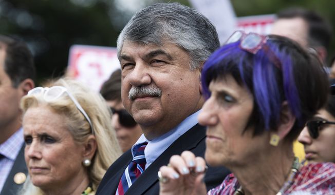 AFL-CIO President Richard Trumka, center, together with Rep. Rosa DeLauro, D-Conn., right, and Rep. Debbie Dingell, D-Mich., join other Democratic lawmakers and supporters voicing their opposition to NAFTA 2.0 and to President Donald Trump&#x27;s new trade deal during a news conference on Capitol Hill in Washington, Tuesday, June 25, 2019. (AP Photo/Manuel Balce Ceneta)