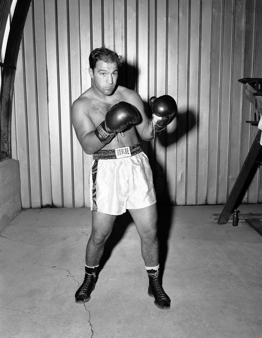 Rocky Marciano at Grossingers in New York for tale of the tape, August 31, 1955. (AP Photo)