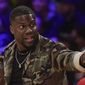 In this Jan. 29, 2019, file photo, actor Kevin Hart gestures during the second half of an NBA basketball game between the Los Angeles Lakers and the Philadelphia 76ers in Los Angeles. Hart has been injured in a car crash in the hills above Malibu on Sunday, Sept. 1. (AP Photo/Mark J. Terrill, File)