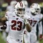 Wisconsin running back Jonathan Taylor (23) runs for a touchdown against South Florida during the second half of an NCAA college football game Friday, Aug. 30, 2019, in Tampa, Fla. (AP Photo/Chris O&#39;Meara)