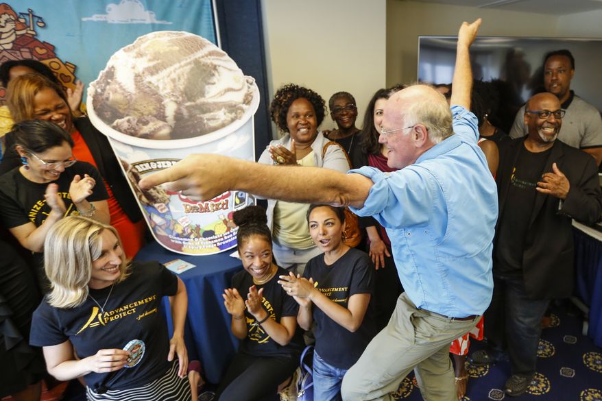 IMAGE DISTRIBUTED FOR PEN &amp; JERRY&#39;S - Ben Cohen, center, and Jerry Greenfield (not pictured), co-founders of Ben &amp; Jerry&#39;s ice cream, unveil their newest flavor, Justice ReMix&#39;d on Tuesday, Sept. 3, 2019 in Washington. This flavor launch is part of Ben &amp; Jerry&#39;s multi-year campaign for criminal justice reform, in partnership with Advancement Project National Office. The two organizations have worked together in St. Louis to close The Workhouse jail, and in Miami to slow the school-to-prison pipeline. (Eric Kayne/ AP Images for Ben &amp; Jerry&#39;s)
