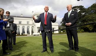 US Vice President Mike Pence, left, and US Ambassador to Ireland Edward Crawford speak to the media at the ambassador&#x27;s residence in Phoenix park, Dublin, Ireland, Tuesday, Sept. 3, 2019. The Vice President is currently in Ireland for a two day visit. (AP Photo/Peter Morrison)