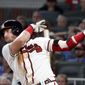 Atlanta Braves&#39; Josh Donaldson follows through on a two-run double in the fifth inning of the team&#39;s baseball game against the Toronto Blue Jays on Tuesday, Sept. 3, 2019, in Atlanta. (AP Photo/John Bazemore)