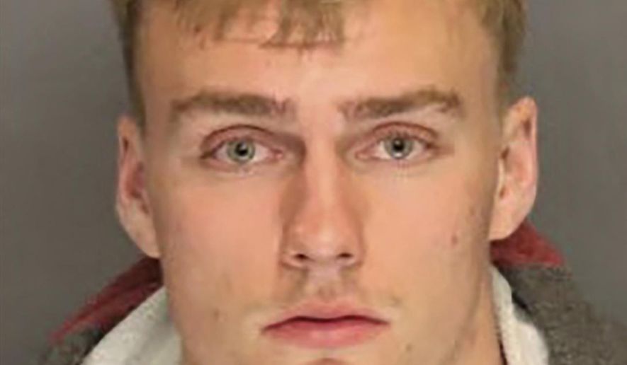 This undated booking photo provided by the Tracy, Calif., Police Department shows 21-year-old Anthony Kreiter-Rhoads, who was arrested on Saturday, Aug. 31, 2019, in the stabbing and killing of 62-year-old Parmjit Singh, a Sikh man who was on nighttime walk at a Northern California park. (Tracy Police Department via AP)