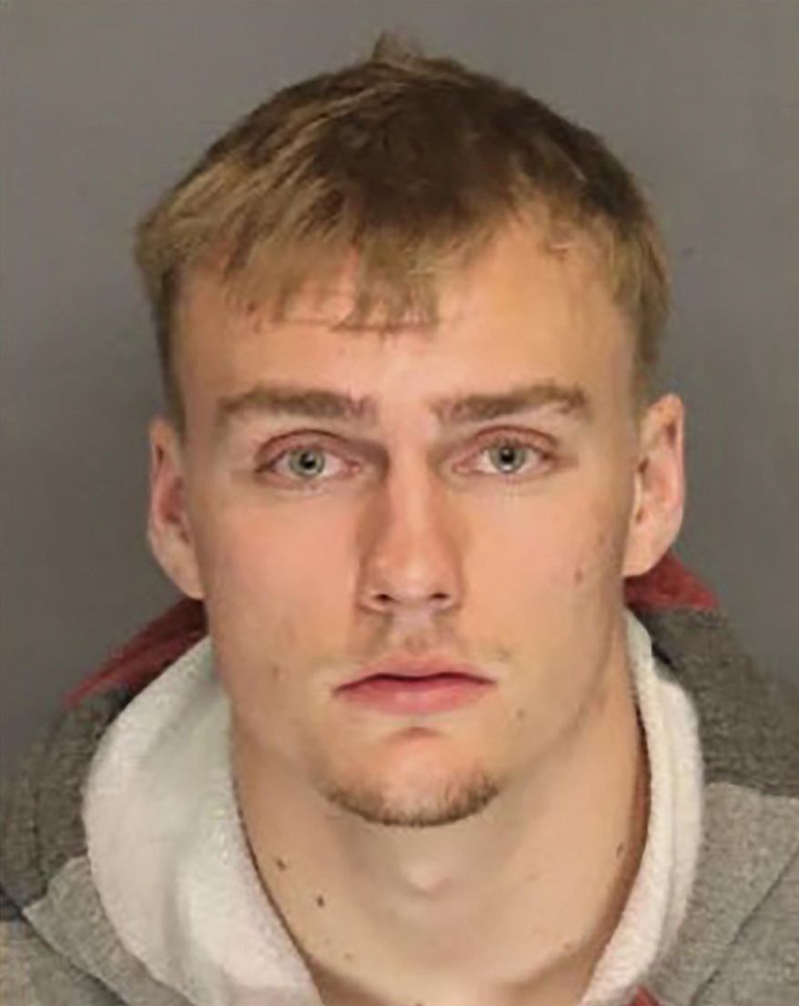 This undated booking photo provided by the Tracy, Calif., Police Department shows 21-year-old Anthony Kreiter-Rhoads, who was arrested on Saturday, Aug. 31, 2019, in the stabbing and killing of 62-year-old Parmjit Singh, a Sikh man who was on nighttime walk at a Northern California park. (Tracy Police Department via AP)