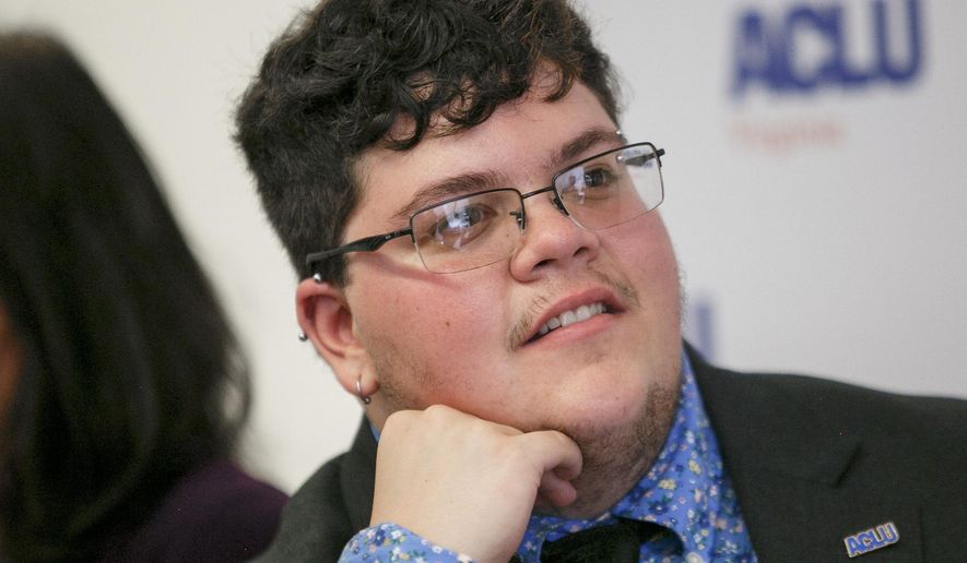 FILE - In this July 23, 2019, file photo, Gavin Grimm, who has become a national face for transgender students, speaks during a news conference held by The ACLU and the ACLU of Virginia at Slover Library in Norfolk, Va. A Virginia school board has filed a federal appeal to defend its transgender bathroom ban. The Gloucester County School Board's appeal appeared Tuesday, Sept. 3, 2019, on the docket for the 4th U.S. Circuit Court of Appeals in Richmond. Briefs containing legal arguments will come next. The board has been in a yearslong legal fight over the policy with former student Gavin Grimm, a transgender male. (Kristen Zeis/The Daily Press via AP, File)