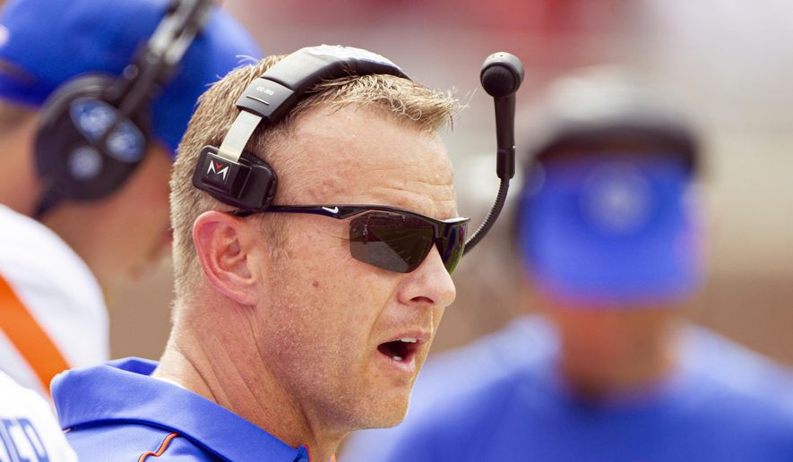 Boise State head coach Bryan Harsin watches in the first half of an NCAA college football game against Florida State in Tallahassee, Fla., Saturday, Aug. 31, 2019. (AP Photo/Mark Wallheiser)