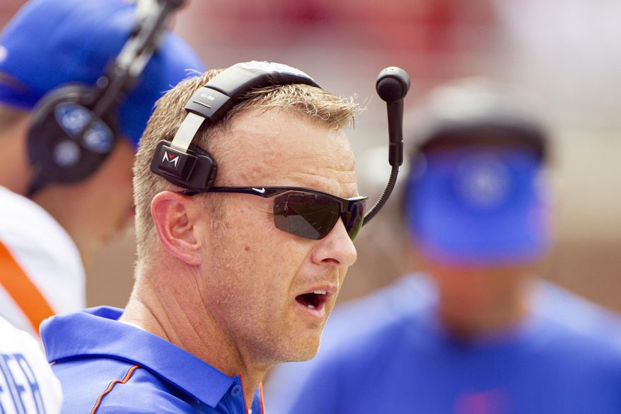 Boise State head coach Bryan Harsin watches in the first half of an NCAA college football game against Florida State in Tallahassee, Fla., Saturday, Aug. 31, 2019. (AP Photo/Mark Wallheiser)