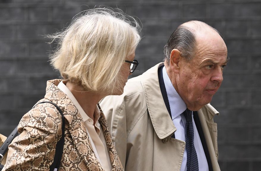 British Conservative Party lawmaker Nicholas Soames leaves 10 Downing Street in London, Tuesday, Sept. 3, 2019. (AP Photo/Alberto Pezzali)