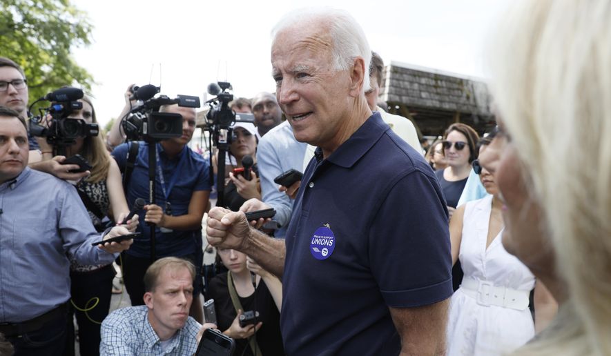 Democratic presidential candidate former Vice President Joe Biden speaks to reporters during the Hawkeye Area Labor Council Labor Day Picnic, Monday, Sept. 2, 2019, in Cedar Rapids, Iowa. (AP Photo/Charlie Neibergall) ** FILE **
