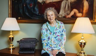 This Aug. 21, 2019 photo shows author Margaret Atwood posing for a portrait in Toronto, Canada. The longtime Toronto resident has written the year’s most anticipated novel, “The Testaments,” the sequel to her classic “The Handmaid’s Tale” and a Booker Prize finalist. In December, Atwood will be honored in New York by the Center for Fiction, which has given its first ever On Screen Award to her and to Hulu executives for the Emmy-winning adaptation of “The Handmaid’s Tale.” (Photo by Arthur Mola/Invision/AP)