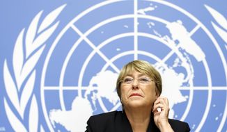 U.N. High Commissioner for Human Rights Chilean Michelle Bachelet listens to the media one year after she took office, during a press conference at the European headquarters of the United Nations in Geneva, Switzerland, Wednesday, September 4, 2019. (Salvatore Di Nolfi/Keystone via AP)