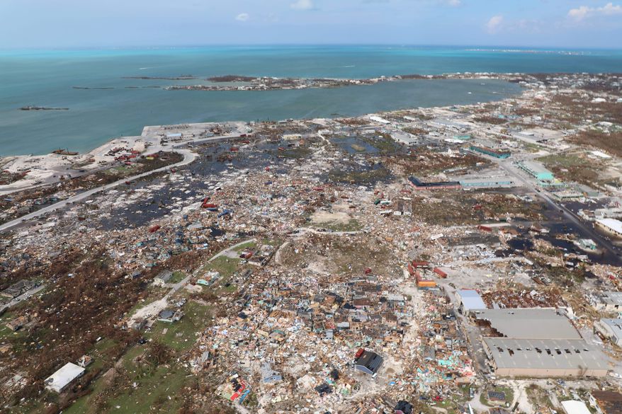 The destruction caused by Hurricane Dorian is seen from the air, in Marsh Harbor, Abaco Island, Bahamas, Wednesday, Sept. 4, 2019. The death toll from Hurricane Dorian has climbed to 20. Bahamian Health Minister Duane Sands released the figure Wednesday evening and warned that more fatalities were likely. (AP Photo/Gonzalo Gaudenzi)