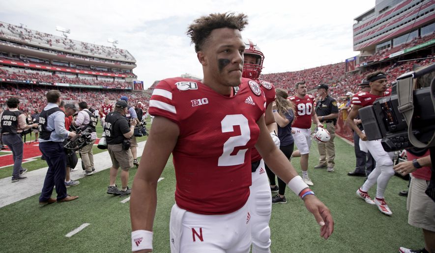 FILE - In this Aug. 31, 2019, file photo, Nebraska quarterback Adrian Martinez (2) walks off the field following a 35-21 win against against South Alabama in an NCAA college football game in Lincoln, Neb. The co-No. 25 Cornhuskers are revved up to play their old Big Eight/Big 12 rivals after a sluggish offensive performance against South Alabama. Martinez must be much better if Nebraska is going to win a road game for the first time under second-year coach Scott Frost. (AP Photo/Nati Harnik, File)