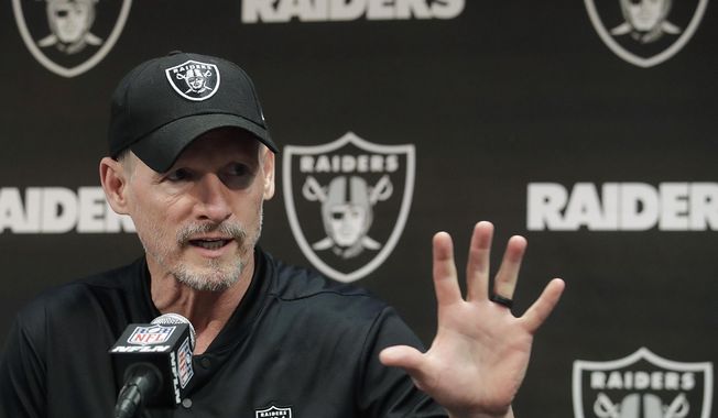 FILE - In this April 11, 2019, file photo, Oakland Raiders general manager Mike Mayock speaks during a news conference at the team&#x27;s NFL football facility in Alameda, Calif. Star receiver Antonio Brown is not with the Oakland Raiders four days before the season opener amid reports he could be suspended over a confrontation with general manager Mike Mayock. Mayock issued a brief statement at the beginning of practice Thursday, Sept. 5, 2019, saying that Brown wasn&#x27;t at the Raiders facility and won&#x27;t be practicing a day after Brown posted a letter from the GM on social media detailing nearly $54,000 in fines.(AP Photo/Jeff Chiu, File)