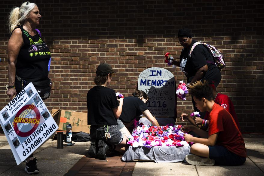 Protesters assemble a makeshift memorial to those lost to drug overdoses last year during a demonstration in support of a proposed supervised injection site, outside the federal courthouse in Philadelphia, Thursday, Sept. 5, 2019. U.S. Attorney William McSwain believes the plan to open a supervised injection site violates the federal Controlled Substances Act and wants a federal judge to declare it illegal before it opens.
(AP Photo/Matt Rourke)