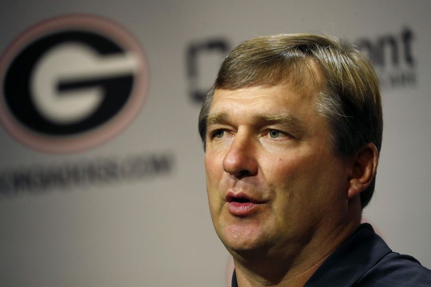 FILE - In this Aug. 2, 2019, file photo, Georgia head coach Kirby Smart speaks to reporters before the team's first scheduled NCAA college football practice Athens, Ga. The Bulldogs shouldn't have to worry about too much crowd noise, even in a rare road opener. Their fans are combining the Labor Day holiday weekend with a popular trip to Nashville, so No. 3 Georgia should have plenty of fans in red Saturday night when they play Vanderbilt in the Southeastern Conference opener for both teams. (AP Photo/John Bazemore, File)