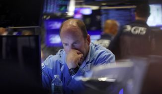 FILE - In this Aug. 23, 2019, file photo trader Peter Mancuso works on the floor of the New York Stock Exchange. Stocks tumbled in August, handing the S&amp;amp;P 500 its second monthly loss this year. Investors are unlikely to be able to recoup those losses in September. (AP Photo/Richard Drew, File)