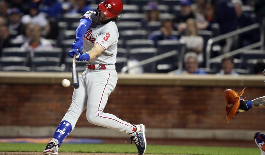 Philadelphia Phillies' Bryce Harper bats during the first inning of a baseball game against the New York Mets, Friday, Sept. 6, 2019, in New York. (AP Photo/Mary Altaffer)