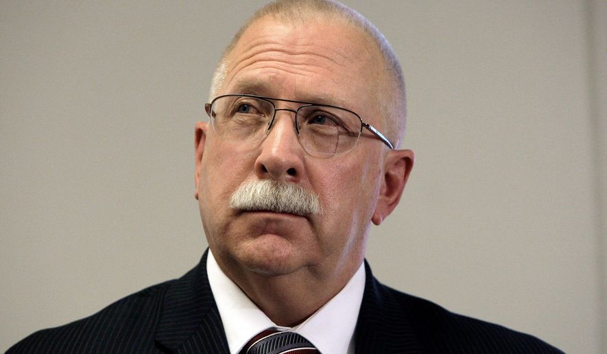 FILE - This Aug. 19, 2010, file photo shows Arizona Corrections Director Charles Ryan at a news conference in Phoenix. Lawyers challenging the quality of health care in Arizona's prisons have asked a judge to take over responsibilities for providing inmate care and appoint an official to run medical and mental health services. They cited the state's noncompliance with elements of a legal settlement in the case. (AP Photo/Ross D. Franklin, File)