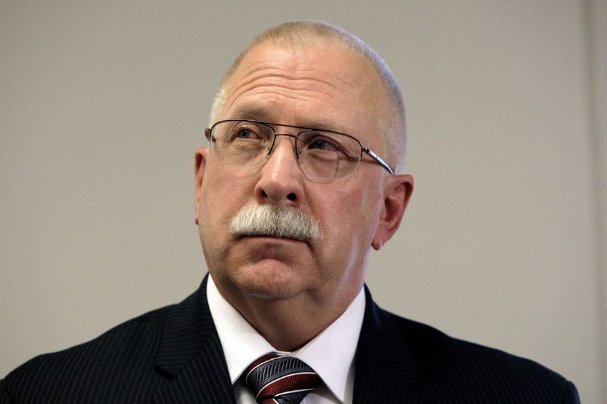 FILE - This Aug. 19, 2010, file photo shows Arizona Corrections Director Charles Ryan at a news conference in Phoenix. Lawyers challenging the quality of health care in Arizona's prisons have asked a judge to take over responsibilities for providing inmate care and appoint an official to run medical and mental health services. They cited the state's noncompliance with elements of a legal settlement in the case. (AP Photo/Ross D. Franklin, File)