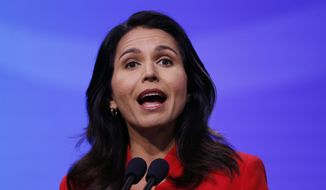 Democratic presidential candidate U.S. Rep. Tulsi Gabbard, D-Hawaii, speaks during the New Hampshire state Democratic Party convention, Saturday, Sept. 7, 2019, in Manchester, N.H. (AP Photo/Robert F. Bukaty) ** FILE **