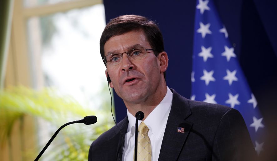 U.S. Defense Secretary Mark Esper delivers a speech during a press conference with French Defense Minister Florence Parly in Paris, Saturday, Sept. 7, 2019. (AP Photo/Christophe Ena)