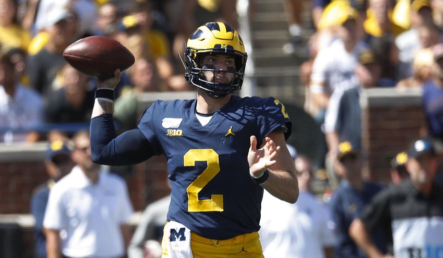 Michigan quarterback Shea Patterson throws against Army in the first half of an NCAA college football game in Ann Arbor, Mich., Saturday, Sept. 7, 2019. (AP Photo/Paul Sancya)