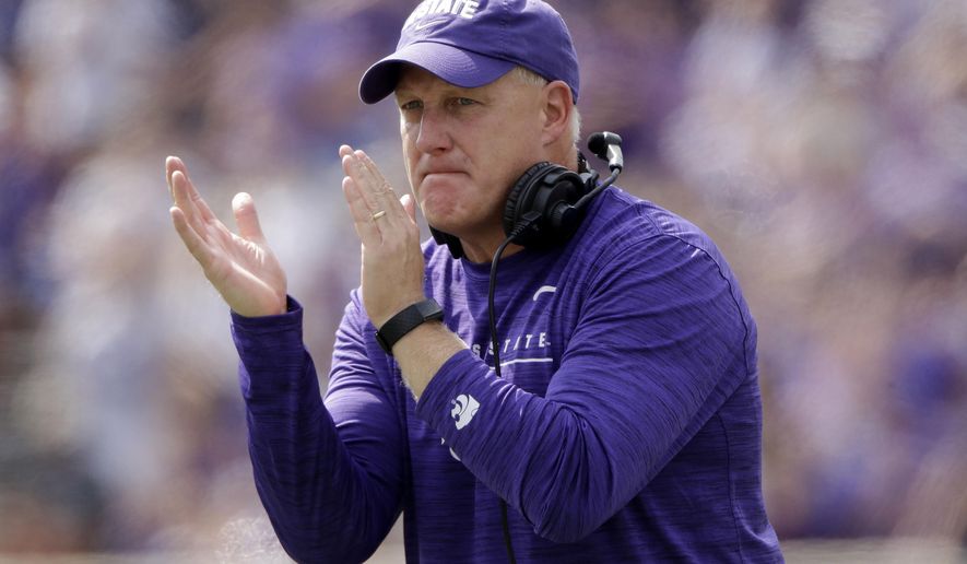 Kansas State head coach Chris Klieman cheers on his players during the first half of an NCAA college football game against Bowling Green Saturday, Sept. 7, 2019, in Manhattan, Kan. (AP Photo/Charlie Riedel)
