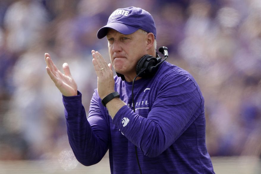Kansas State head coach Chris Klieman cheers on his players during the first half of an NCAA college football game against Bowling Green Saturday, Sept. 7, 2019, in Manhattan, Kan. (AP Photo/Charlie Riedel)