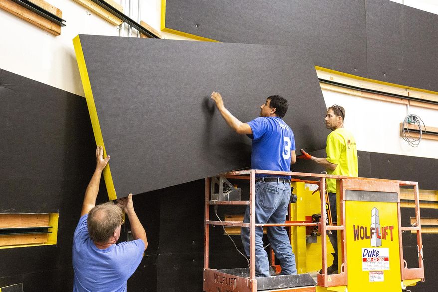 Construction continues inside a theater, Tuesday, Aug. 27, 2019, at a new FilmScene in the Chauncey building in Iowa City, Iowa. (Joseph Cress/Iowa City Press-Citizen via AP)