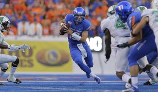 Boise State quarterback Hank Bachmeier (19) runs the ball during the first half of an NCAA college football game against Marshall in Boise, Idaho, Friday, Sept. 6, 2019. (AP Photo/Otto Kitsinger)