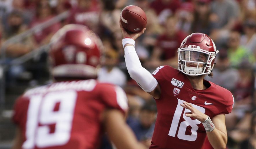 Washington State quarterback Anthony Gordon, right, throws a pass to wide receiver Brandon Arconado during the first half of an NCAA college football game against Northern Colorado in Pullman, Wash., Saturday, Sept. 7, 2019. (AP Photo/Young Kwak)