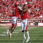 Utah wide receiver Demari Simpkins (3) celebrates with teammate Solomon Enis (21) after scoring against Northern Illinois in the first half of an NCAA college football game Saturday, Sept. 9, 2019, Salt Lake City. (AP Photo/Rick Bowmer)