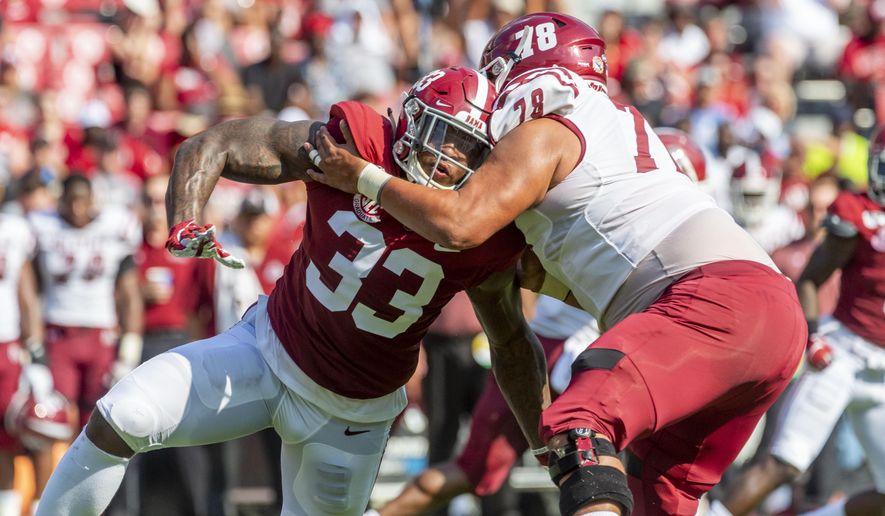 Alabama linebacker Anfernee Jennings (33) battles New Mexico State offensive lineman Brian Trujillo (78) during the first half of an NCAA college football game Saturday, Sept. 7, 2019, in Tuscaloosa, Ala. (AP Photo/Vasha Hunt)