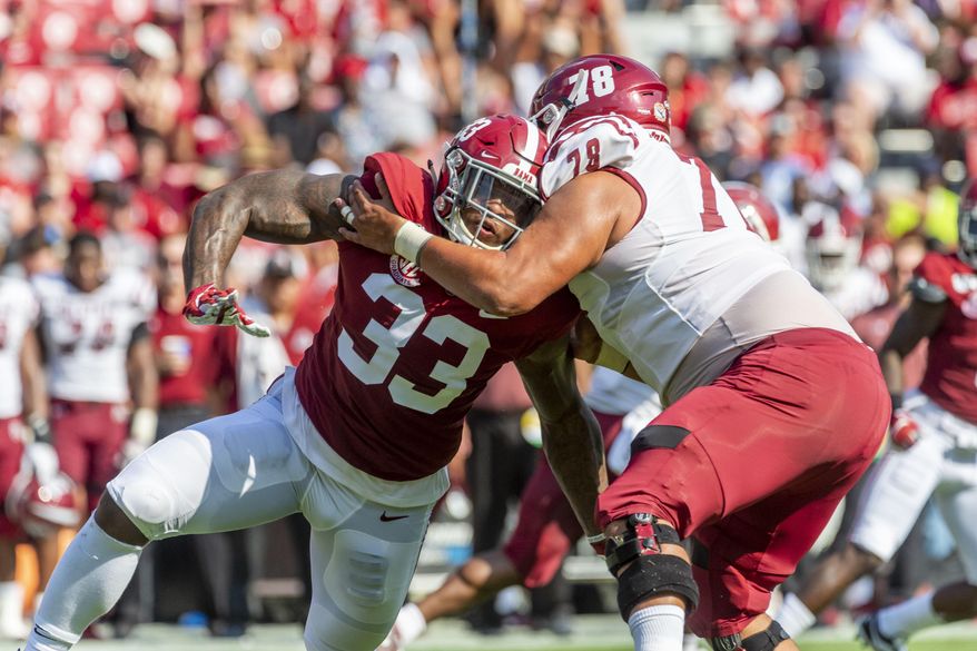 Alabama linebacker Anfernee Jennings (33) battles New Mexico State offensive lineman Brian Trujillo (78) during the first half of an NCAA college football game Saturday, Sept. 7, 2019, in Tuscaloosa, Ala. (AP Photo/Vasha Hunt)