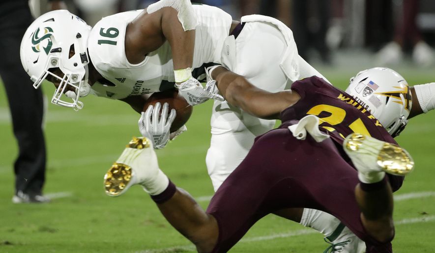 Sacramento State tight end Marshel Martin (16) is tackled by Arizona State linebacker Tyler Whiley during the first half of an NCAA college football game Friday, Sept. 6, 2019, in Tempe, Ariz. (AP Photo/Matt York)
