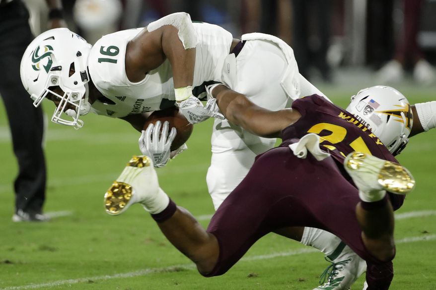 Sacramento State tight end Marshel Martin (16) is tackled by Arizona State linebacker Tyler Whiley during the first half of an NCAA college football game Friday, Sept. 6, 2019, in Tempe, Ariz. (AP Photo/Matt York)