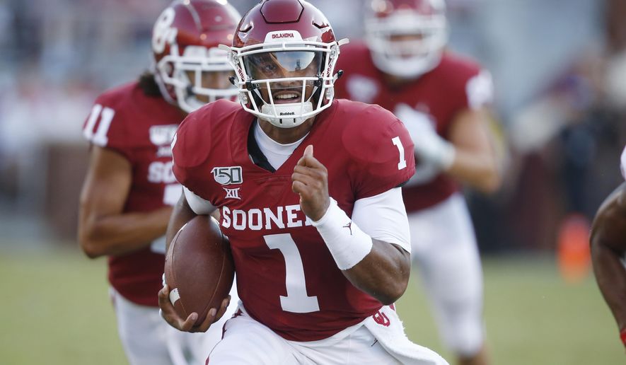 Oklahoma quarterback Jalen Hurts (1) carries in the second quarter of an NCAA college football game against South Dakota Saturday, Sept. 7, 2019, in Norman, Okla. (AP Photo/Sue Ogrocki)