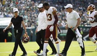 Washington Redskins&#39; Quinton Dunbar walks off the field after an injury during the second half of an NFL football game against the Philadelphia Eagles, Sunday, Sept. 8, 2019, in Philadelphia. (AP Photo/Matt Rourke)