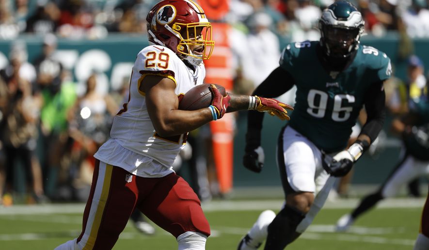 Washington Redskins' Derrius Guice runs during the first half of an NFL football game against the Philadelphia Eagles, Sunday, Sept. 8, 2019, in Philadelphia. (AP Photo/Michael Perez)