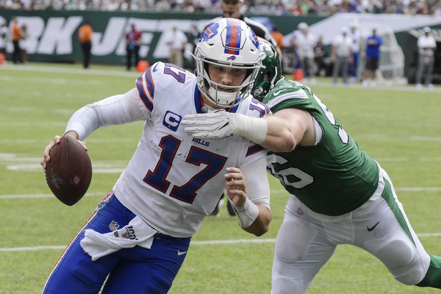 Buffalo Bills&#x27; Josh Allen (17) runs past New York Jets&#x27; Henry Anderson (96) for a touchdown during the second half of an NFL football game Sunday, Sept. 8, 2019, in East Rutherford, N.J. (AP Photo/Bill Kostroun)