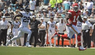 Kansas City Chiefs wide receiver Sammy Watkins, right, outruns Jacksonville Jaguars defensive back D.J. Hayden to the end zone for a 68-yard touchdown on a pass play during the first half of an NFL football game, Sunday, Sept. 8, 2019, in Jacksonville, Fla. (AP Photo/Phelan M. Ebenhack)