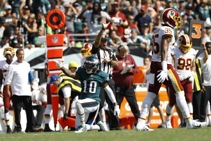 Philadelphia Eagles&#39; DeSean Jackson (10) reacts after making a first-down catch during the second half of an NFL football game against the Washington Redskins, Sunday, Sept. 8, 2019, in Philadelphia. (AP Photo/Michael Perez)