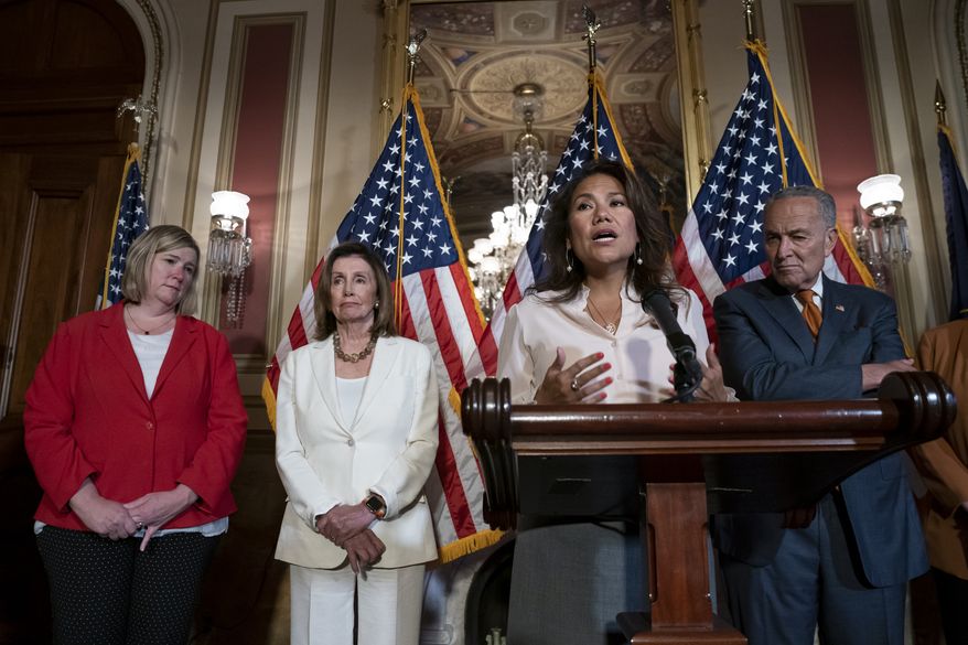 From left, Dayton, Ohio Mayor Nan Whaley whose city suffered a mass shooting Aug. 4, 2019, Speaker of the House Nancy Pelosi, D-Calif., Rep. Veronica Escobar, D-Texas, whose district contains El Paso, Texas, where a gunman killed 22 people at an El Paso, Texas, Walmart, and Senate Minority Leader Chuck Schumer, D-N.Y., call for a Senate vote on the House-passed Bipartisan Background Checks Act as Congress returns for the fall session with pressure mounting on Senate Majority Leader Mitch McConnell to address gun violence, at the Capitol in Washington, Monday, Sept. 9, 2019. (AP Photo/J. Scott Applewhite)