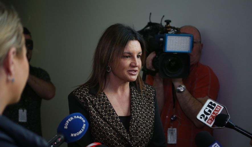 Sen. Jacqui Lambie addresses reporters in Parliament House in Canberra, Australia, on Monday, Sept. 9, 2019. The unaligned senator says she will support laws that would force the jobless to undergo drug tests in return for welfare checks if lawmakers are also subjected to illicit drug screening.(AP Photo/Rod McGuirk)